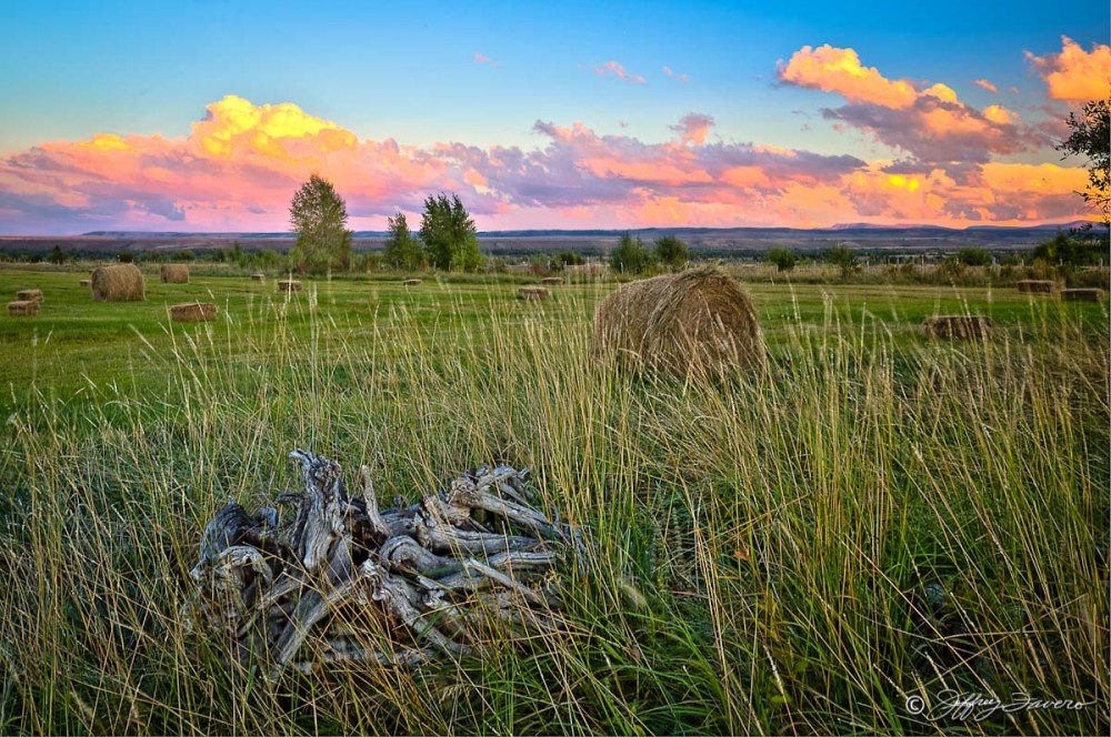 Colorful Sky And Hay Bales